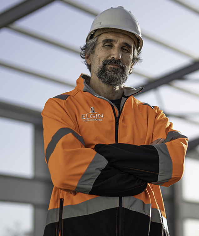 Portrait, Civil Engineers Team at Metal Building Site.